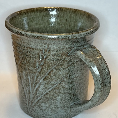 White glazed speckled iron stoneware mug